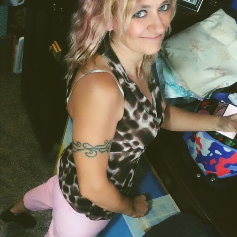 Animal print sleeveless blouse